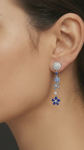 woman wearing reymey mismatched earring